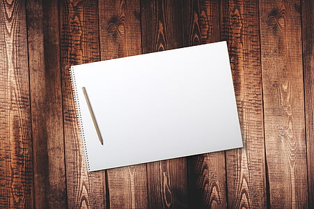 brown wooden pencil with white notebook thumbnail