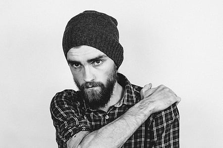 man wearing gingham sport shirt and black knitted cap thumbnail