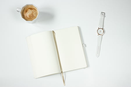 round white analog watch with white strap thumbnail