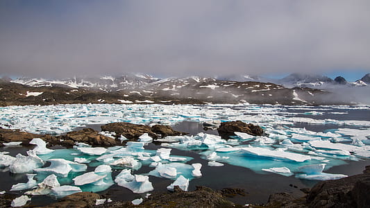 icebergs near mountains thumbnail