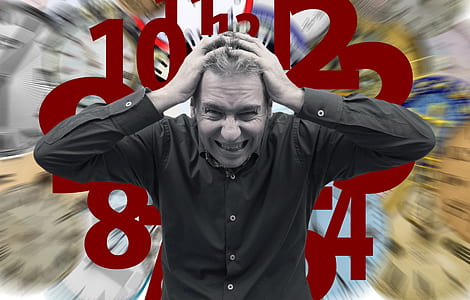 man holding his head with poker face thumbnail