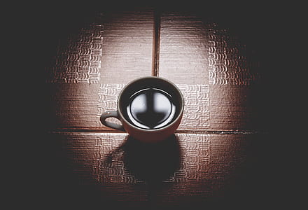 selective focus photo of mug filled with coffee thumbnail