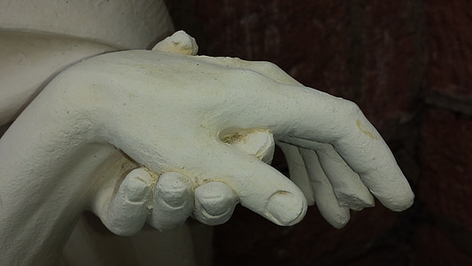 person's hand statue thumbnail