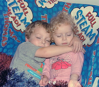 boy hugging girl wearing pink shirt thumbnail