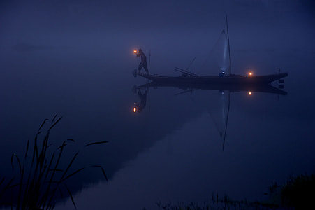 man fishing at night thumbnail