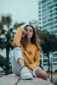 woman sitting on bench thumbnail