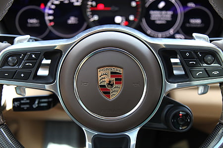 black, brown, and gray Porsche multi-function vehicle steering wheel thumbnail