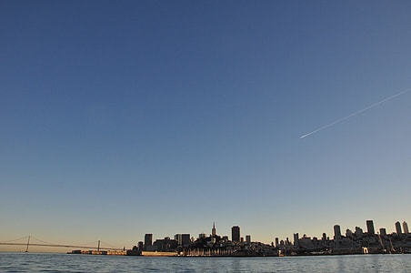 photo of city on body of water during daytime thumbnail