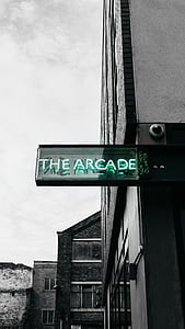 selective colored of green The Arcade neon light signboard thumbnail