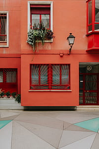 closeup photography of red concrete building \ thumbnail