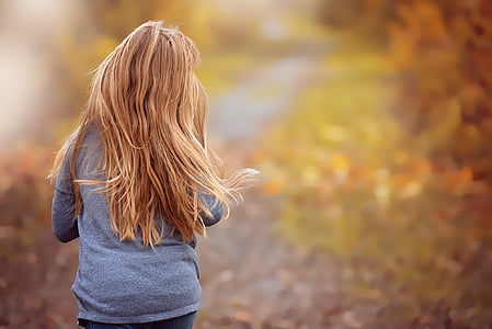 girl wearing gray sweatshirt thumbnail