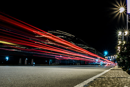 time lapse photo of concrete road with street lights thumbnail