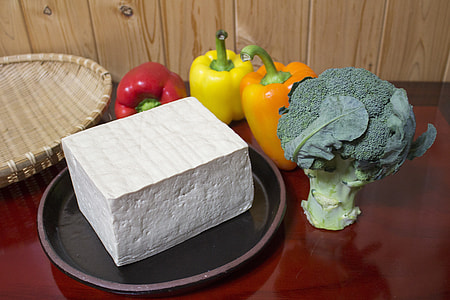 cream cheese beside vegetables on table thumbnail
