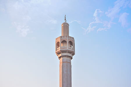 Low Angle Photography Of Brown Concrete Tower thumbnail