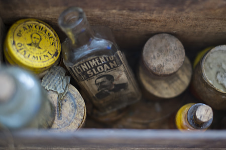 clear glass wine bottle in shallow focus photography thumbnail