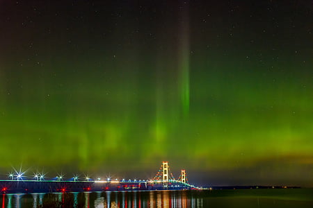 multicolored metal bridge at nighttime thumbnail
