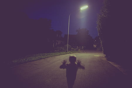 children running against street lamp thumbnail