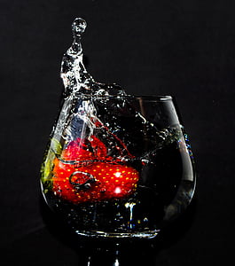clear drinking glass filled with white liquid thumbnail