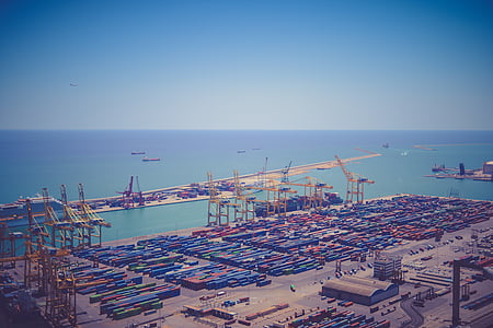 high angle photography of piled intermediate bulk container beside sea thumbnail