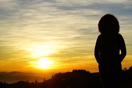 silhouette photo of person during golden hour thumbnail