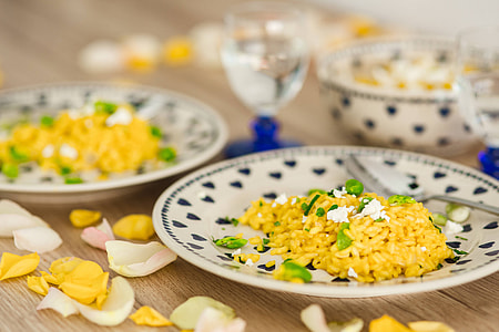 Risotto with broad bean on a cute plate with blue hearts thumbnail