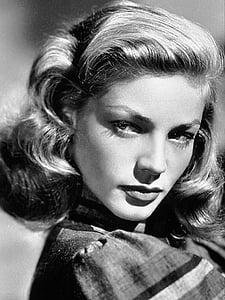 grayscale photo of woman wearing top thumbnail