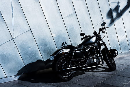 parked black and gray cruiser motorcycle thumbnail