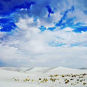desert under white clouds thumbnail