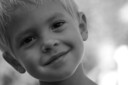 grayscaled photo of boy thumbnail