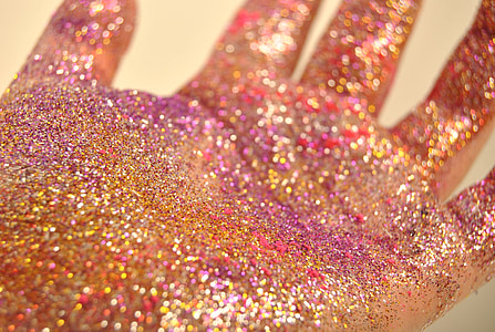 left person's hand with glitter thumbnail