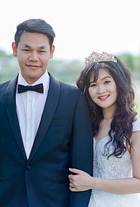 Women's White Floral Wedding Dress and Men's Black 1-button Blazer thumbnail