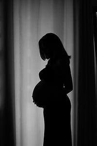 silhouette of pregnant woman thumbnail