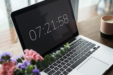 silver MacBook Pro on table thumbnail