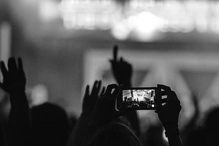 grayscale photography of person taking photo thumbnail