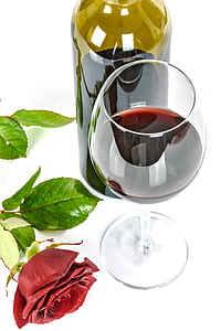 clear wine glass beside red rose thumbnail