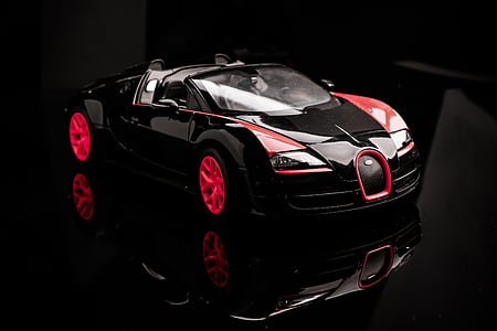 black and red Bugatti Veyron Super Sport die-cast metal model thumbnail
