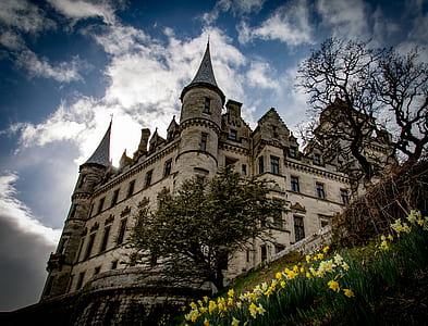gray concrete castle under white clouds thumbnail