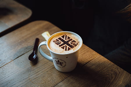 white ceramic mug with cappuccino art thumbnail