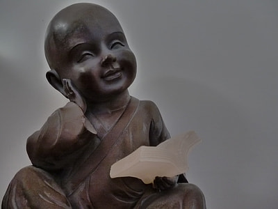 gray ceramic figurine table decor thumbnail
