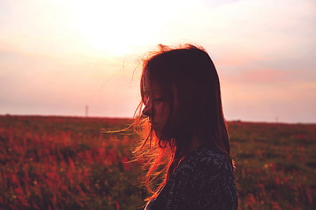 girl standing on field thumbnail