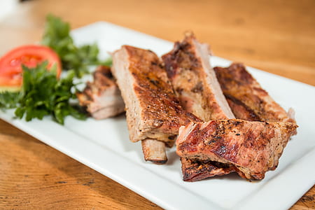 grilled meat served on white plate thumbnail