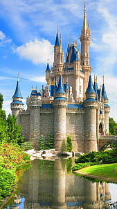 photo of blue and beige castle beside body of water thumbnail