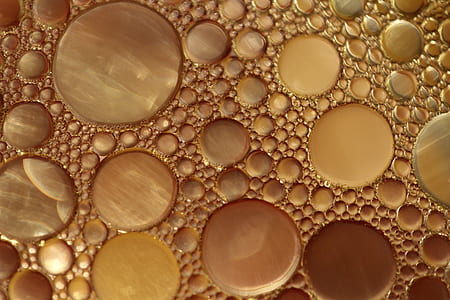 photo of yellow bubble formation on liquid thumbnail