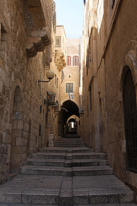 concrete narrow pathway under white clouds thumbnail