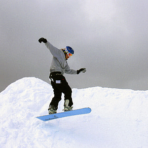 man riding on snowboard thumbnail
