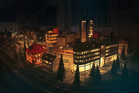 Design Model Of Miniature Houses Near Railway Station With Night Lights thumbnail