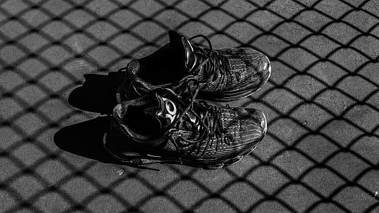 two pairs of black Kevin Durant shoes thumbnail