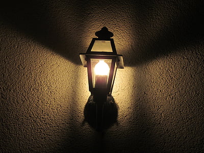 turned-on sconce lamp thumbnail