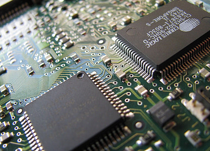green circuit board with two black integrated circuits thumbnail