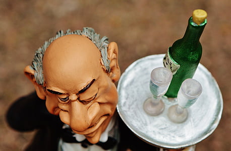 man holding serving tray thumbnail